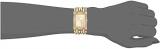GUESS  Gold-Tone Crystal Multi-Chain Bracelet Watch with Self-Adjustable Links. Color: Gold-Tone (Model: U1121L2)