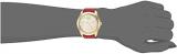 GUESS  Comfortable Gold-Tone + Red Stain Resistant Silicone Logo Watch. Color: Red (Model: U0911L1)