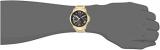 GUESS  Gold-Tone Stainless Steel + Black Bracelet Watch with Day, Date + 24 Hour Military/Int'l Time. Color: Gold-Tone (Model: U1184G2)