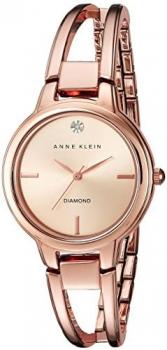 Anne Klein Women's AK/2626RGRG Diamond-Accented Dial Rose Gold-Tone Open Bangle Watch